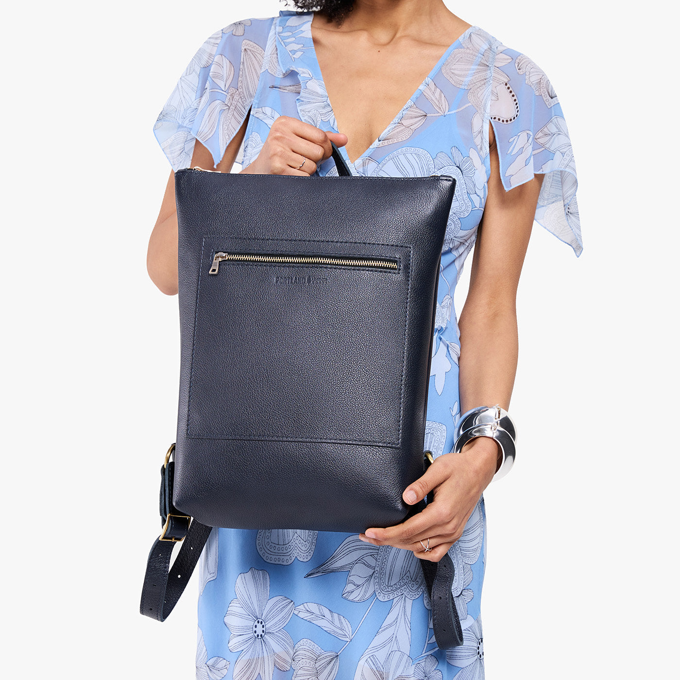 Night Owl | Model wearing rectangular slim leather laptop backpack