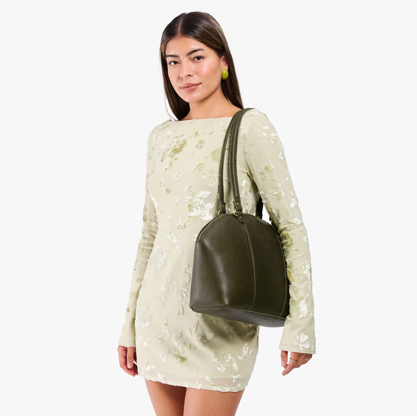 Pebbled Olive*Large | Model holding a half circle crossbody bag with handles and removable crossbody strap