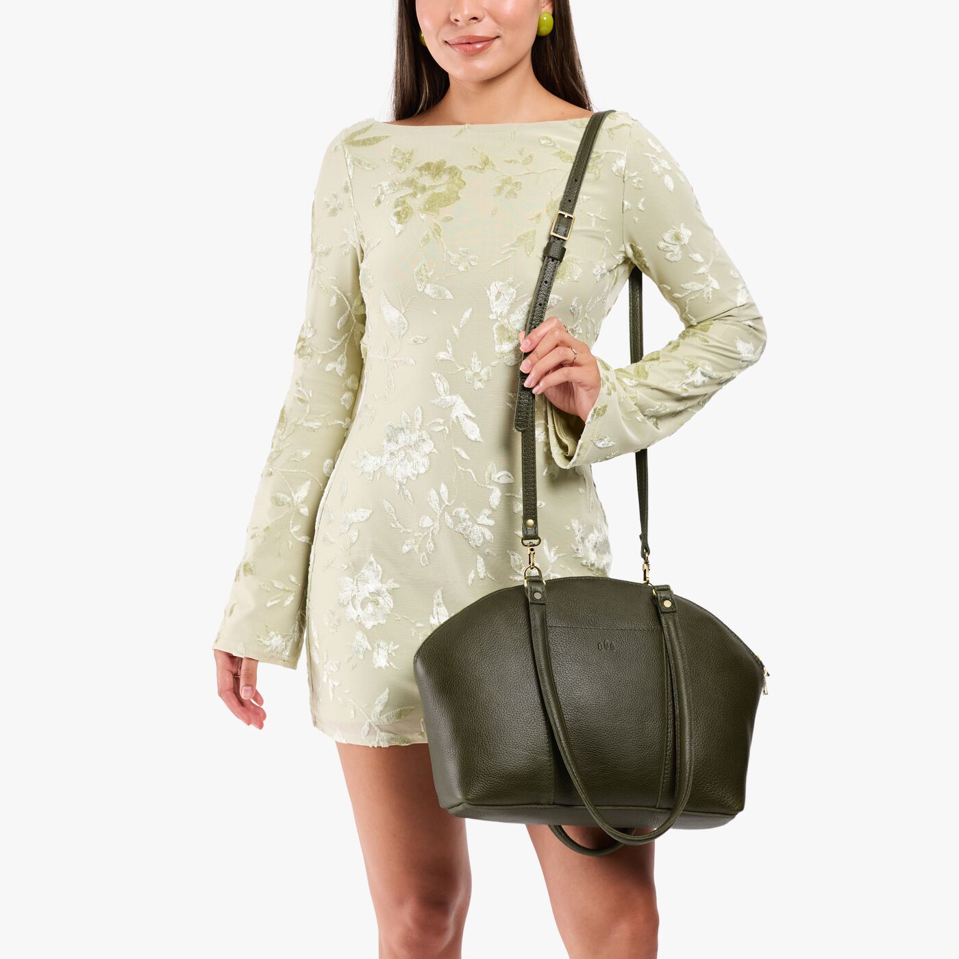 Pebbled Olive*Large | Model holding a half circle crossbody bag with handles and removable crossbody strap