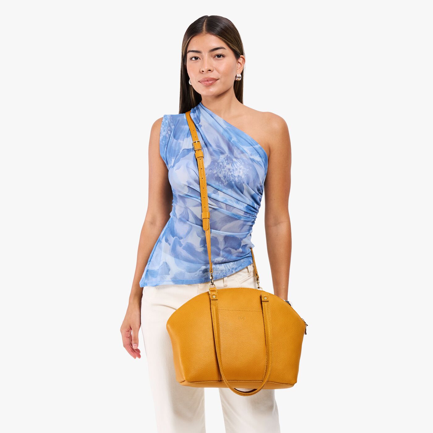 Sunshine*Large | Model holding a half circle crossbody bag with handles and removable crossbody strap