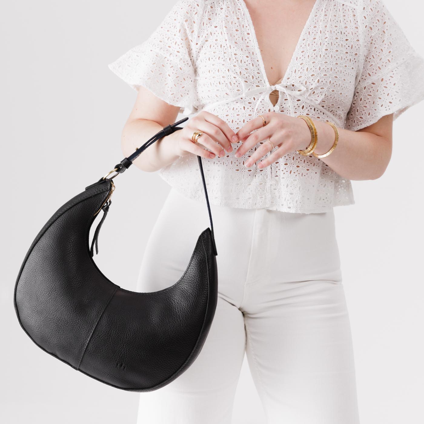 Pebbled--black*Large | Large crescent shaped shoulder bag with zipper closure and adjustable strap