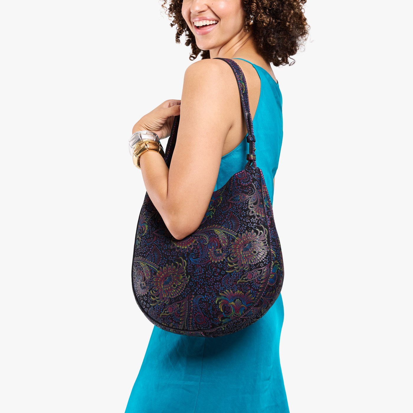 Carnival*Large | Model holding round leather purse with adjustable shoulder strap