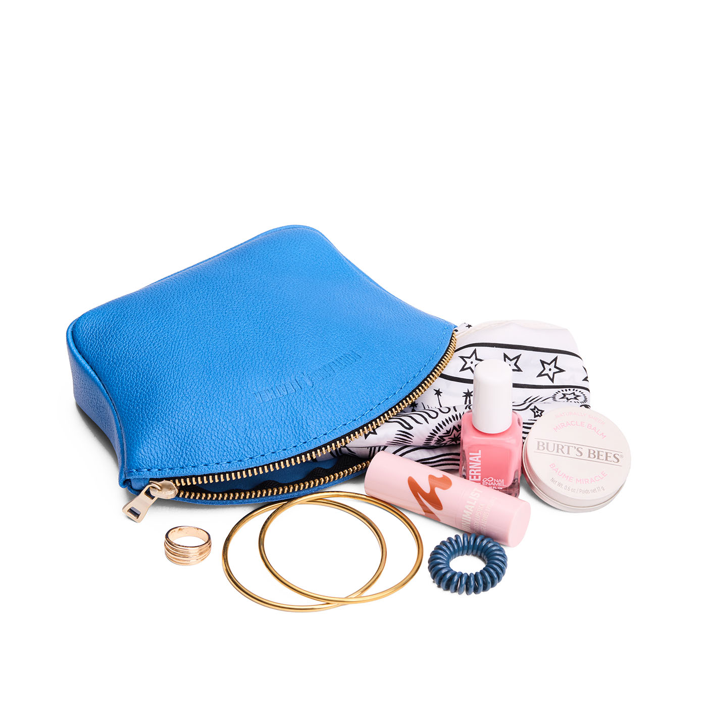 Skydive*Large | Seashell shaped leather makeup bag with curved top zipper and flat bottom