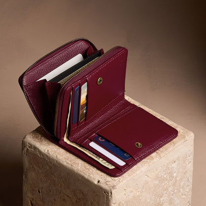 Hunter | Open wallet with card and storage pockets on a light brown background