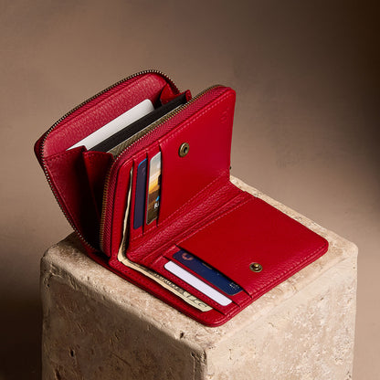 Icon Red | Open wallet with card and storage pockets on a light brown background
