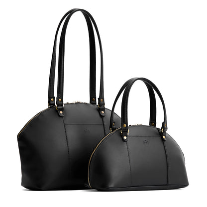 Black | Size comparison of the large and small half circle crossbody bag with handles and removable crossbody strap