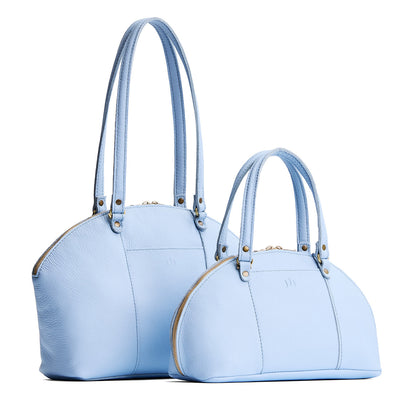 Skyway | Size comparison of the large and small half circle crossbody bag with handles and removable crossbody strap
