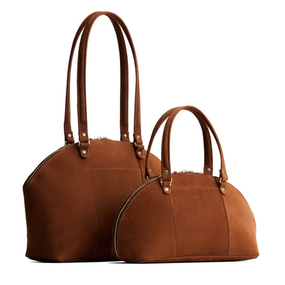 Wildwood | Size comparison of the large and small half circle crossbody bag with handles and removable crossbody strap