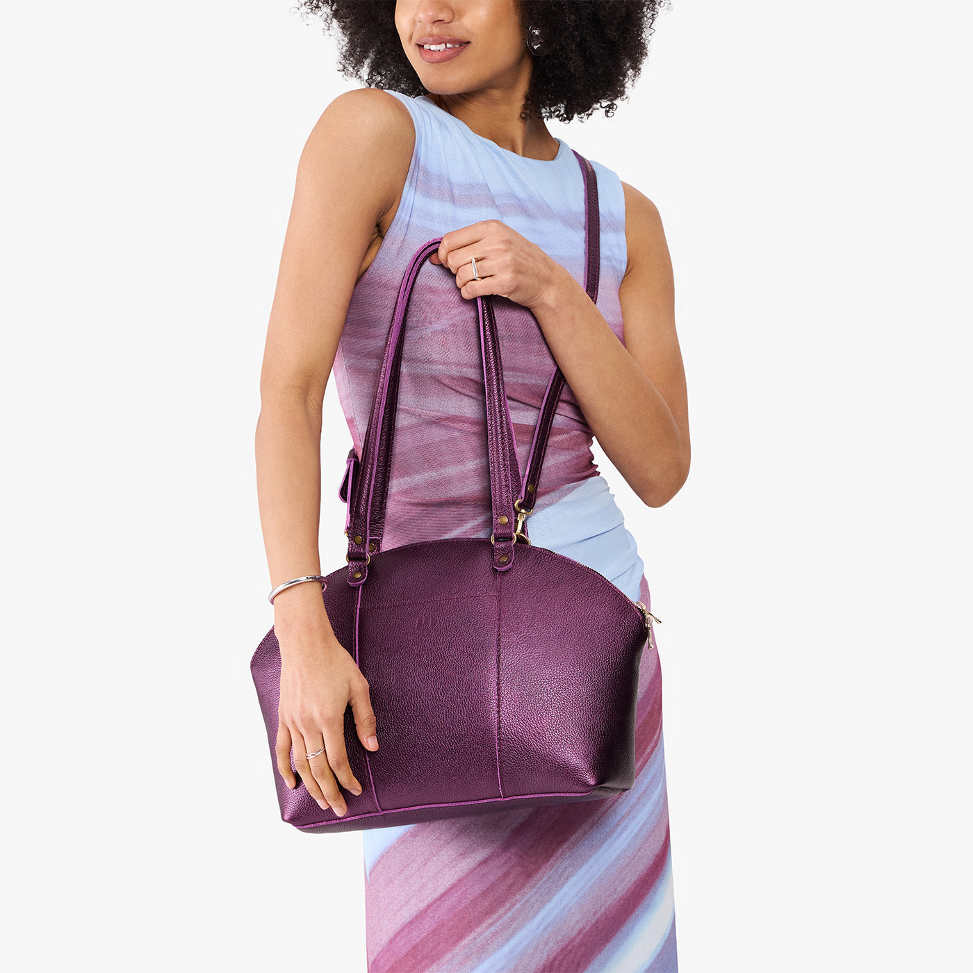 Ultra Violet*Large | Model holding a half circle crossbody bag with handles and removable crossbody strap