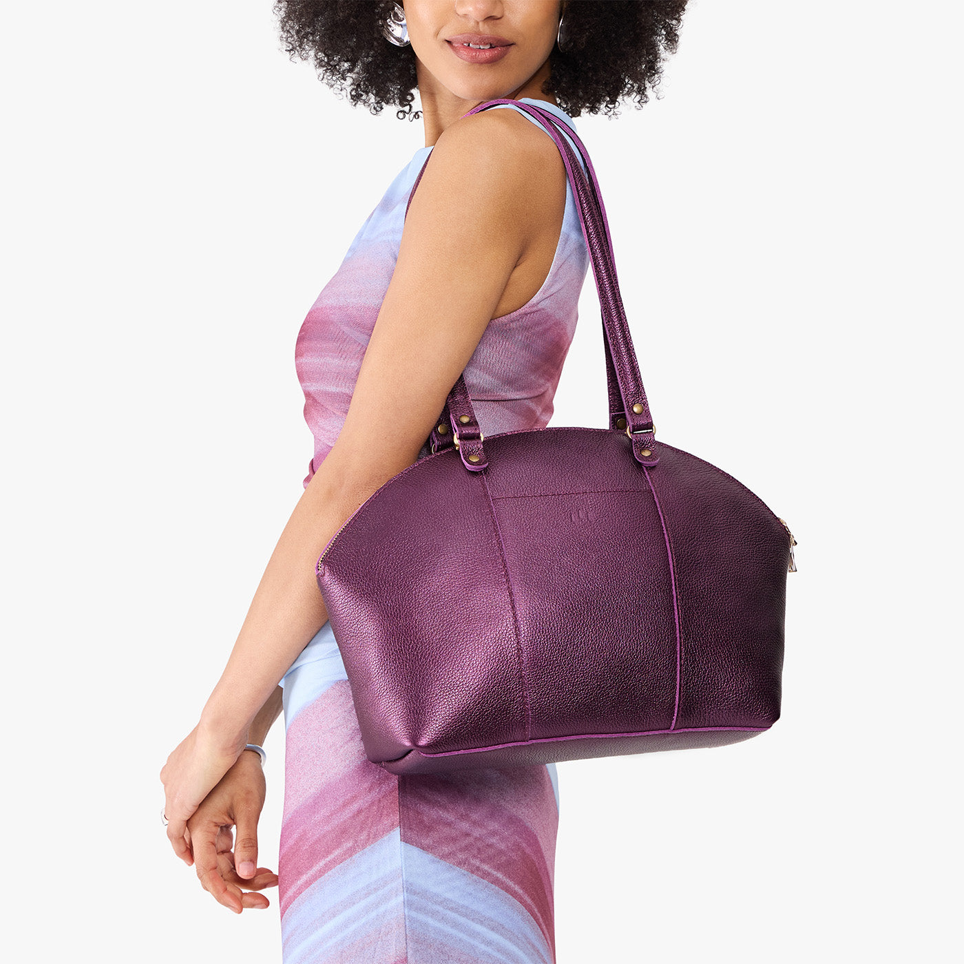 Ultra Violet*Large | Model holding a half circle crossbody bag with handles and removable crossbody strap