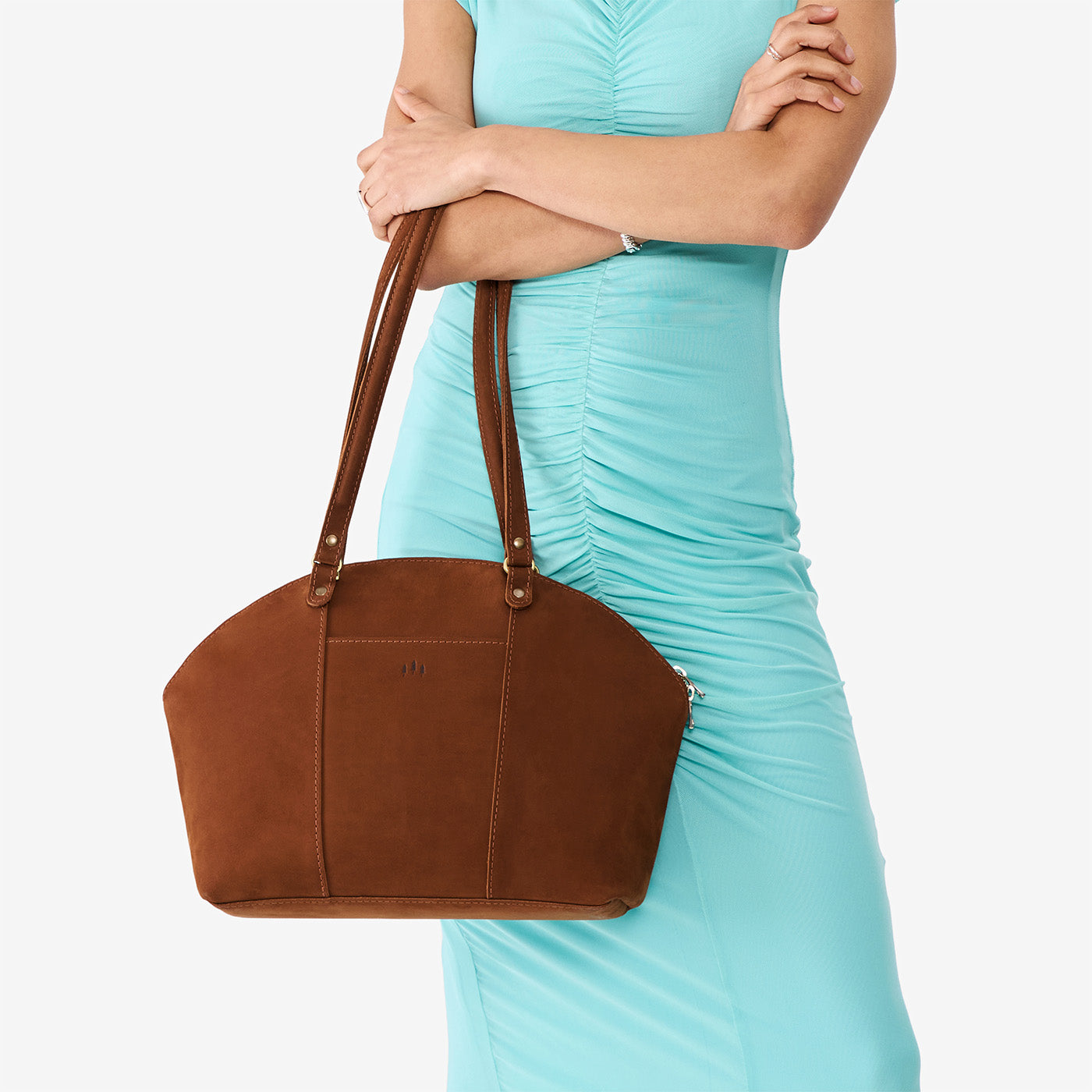 Wildwood*Large | Model holding a half circle crossbody bag with handles and removable crossbody strap