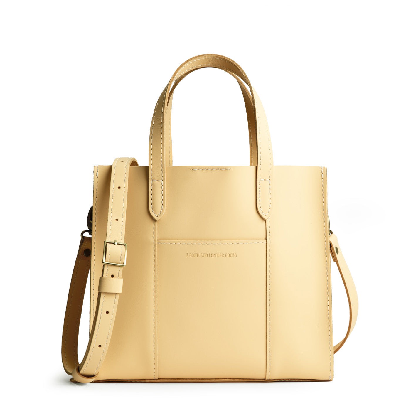 Vanilla | Structured mid-size tote bag with overlapping panels and crossbody strap