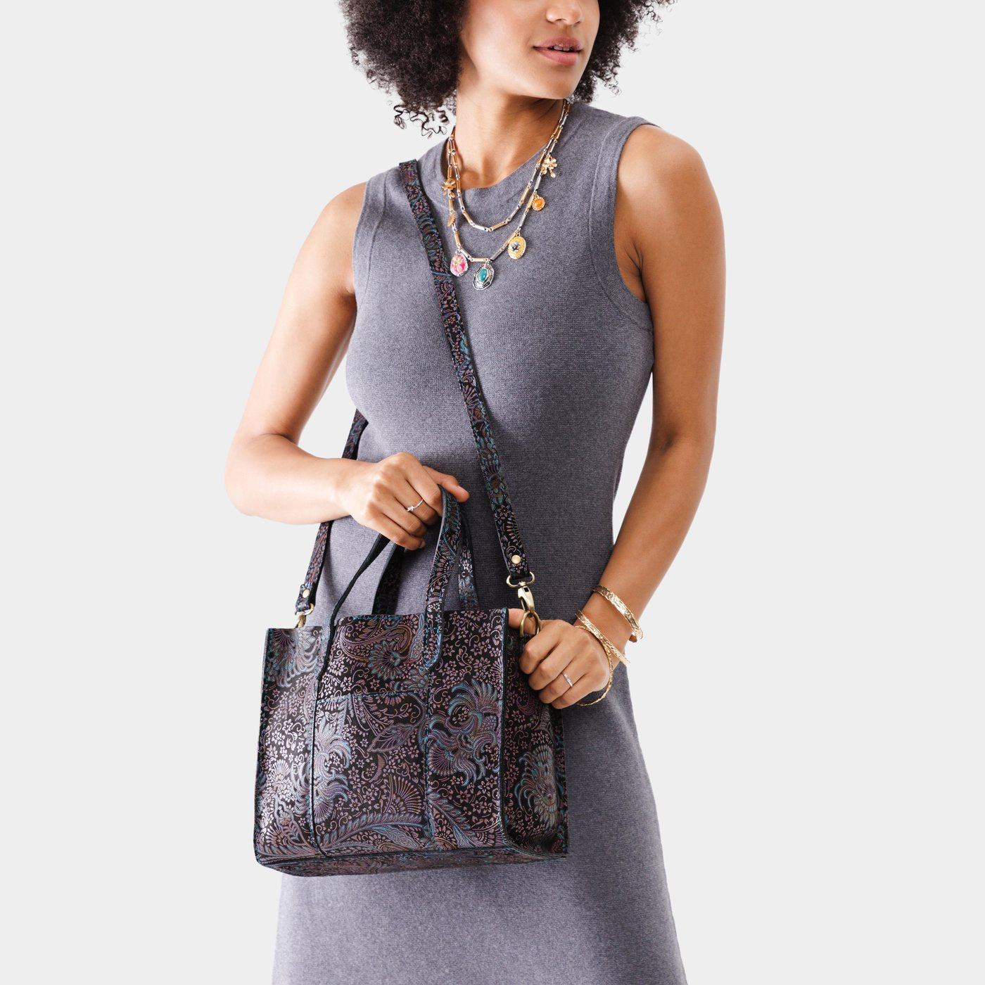 Masquerade | Structured mid-size tote bag with overlapping panels and crossbody strap