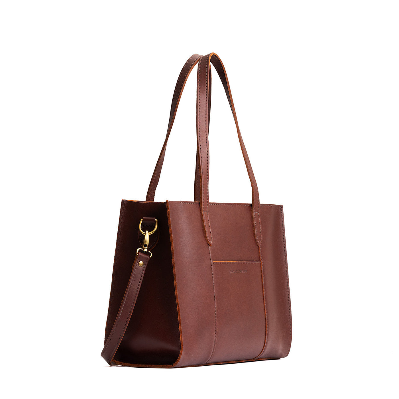 Cognac*East/West | Structured wide tote bag with overlapping panels and crossbody strap