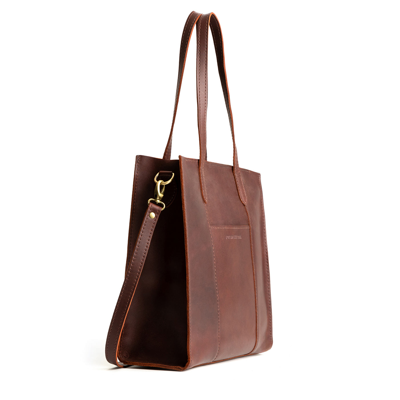 Cognac*North/South | Structured large tote bag with overlapping panels and crossbody strap