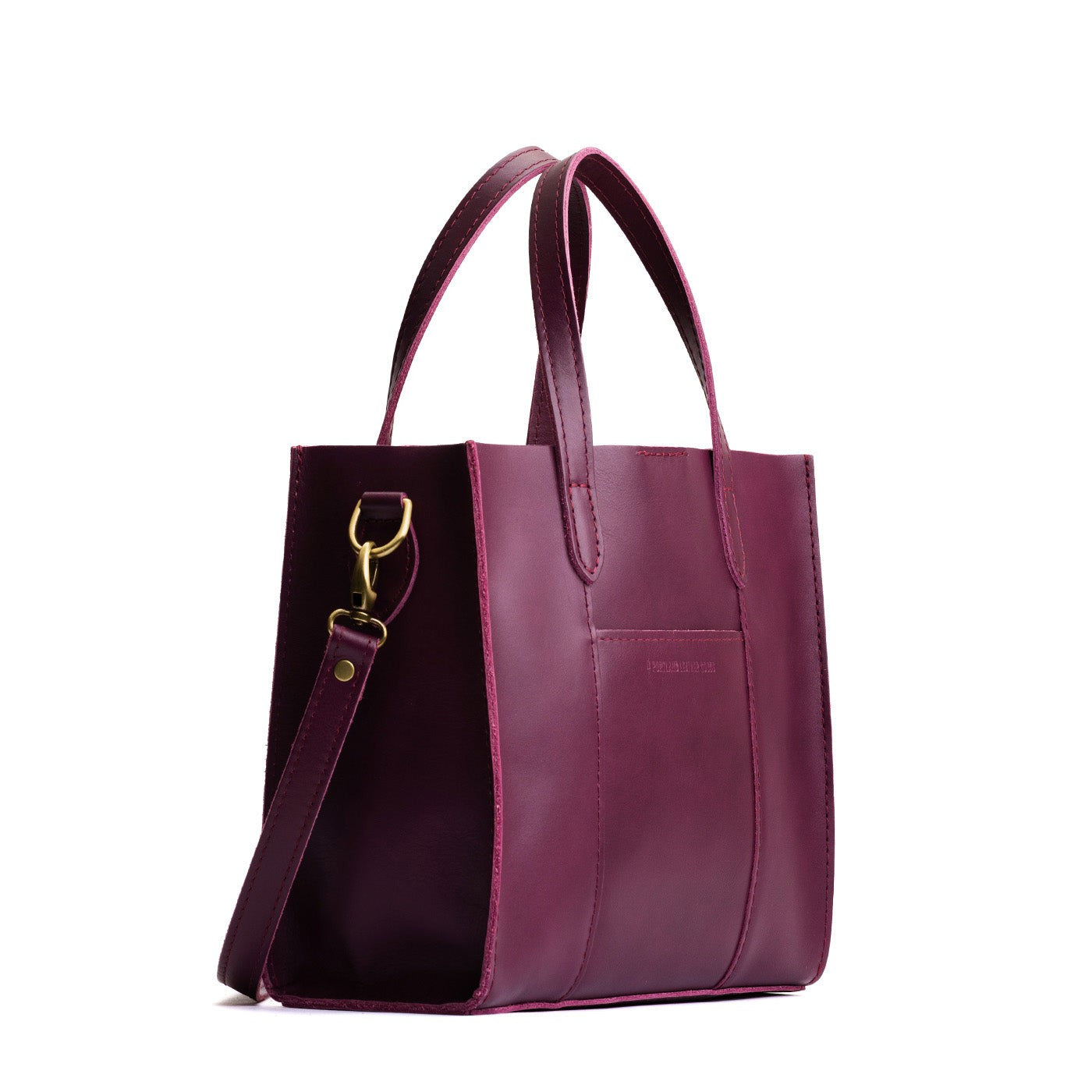 Lollipop | Structured mid-size tote bag with overlapping panels and crossbody strap