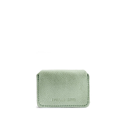 Beetle | Backside of small leather wallet with debossed PLG logo