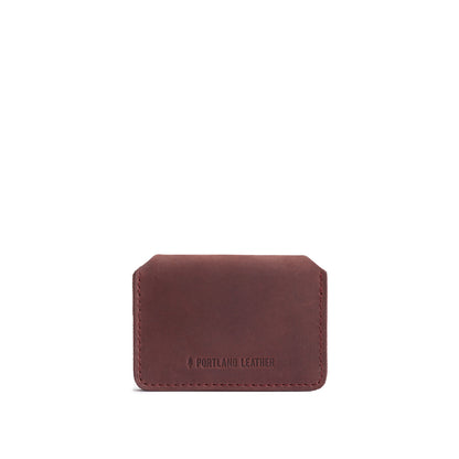 Merlot | Backside of small leather wallet with debossed PLG logo