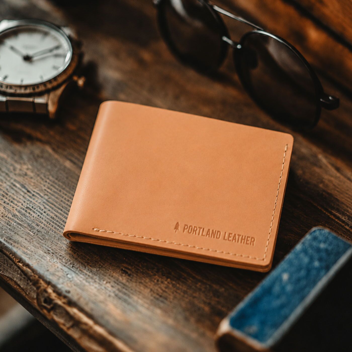 Naturale | a bifold wallet on a wood table