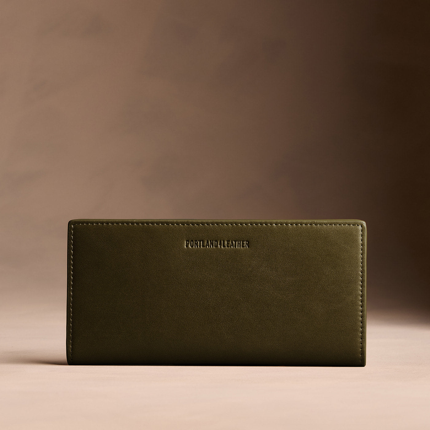 Bay Green*Large | Slim leather bifold wallet with multiple card slots and a zippered back pocket
