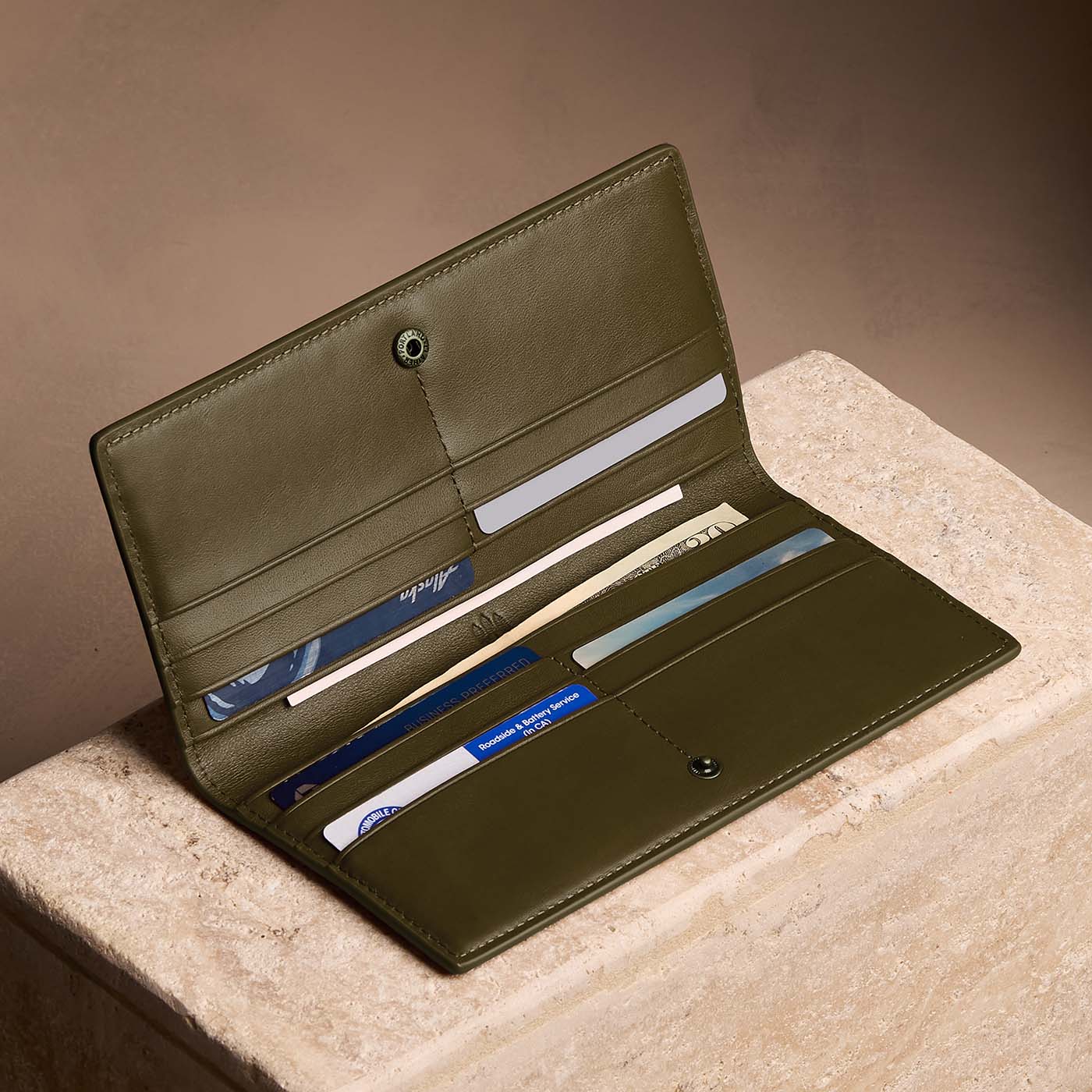 Bay Green*Large | Slim leather bifold wallet with multiple card slots and a zippered back pocket