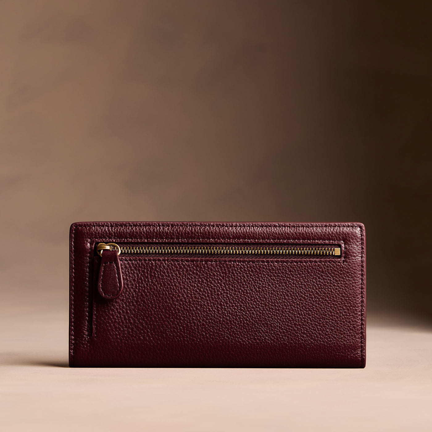 Hunter*Large | Slim leather bifold wallet with multiple card slots and a zippered back pocket - back view
