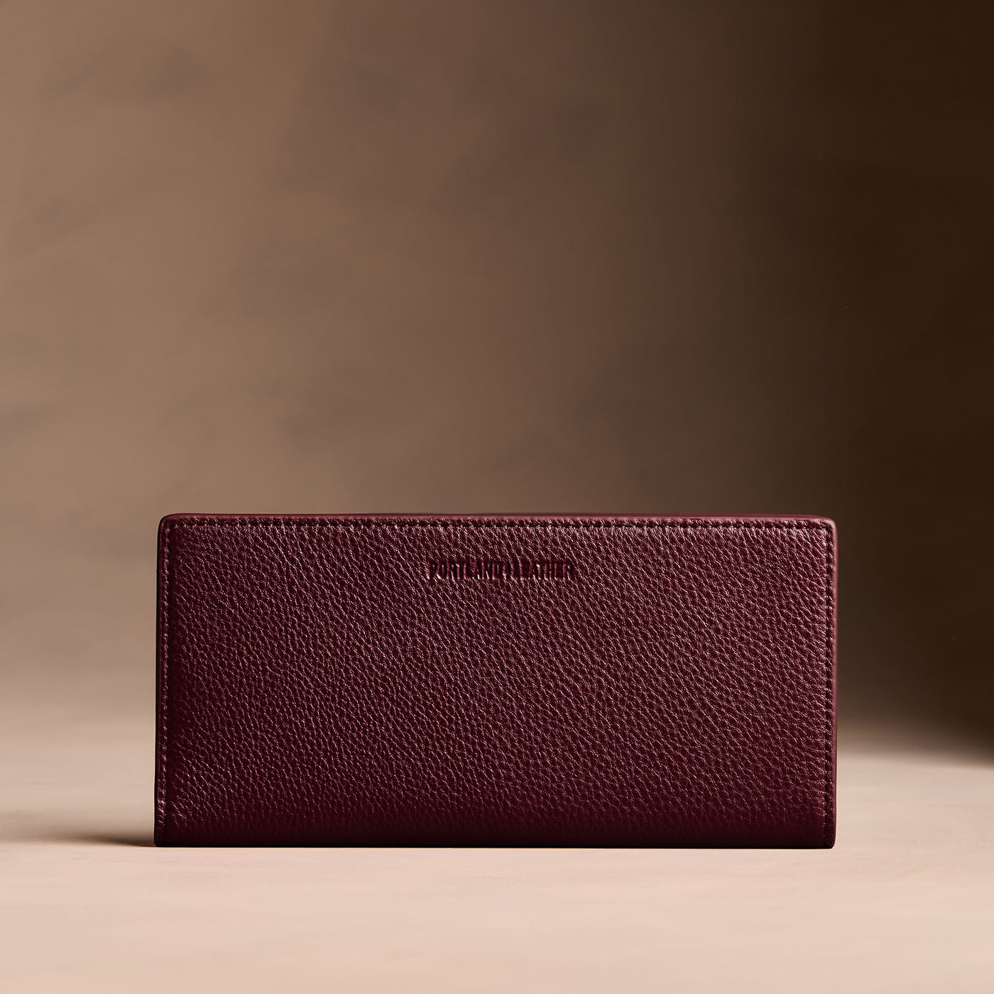 Hunter*Large | Slim leather bifold wallet with multiple card slots and a zippered back pocket