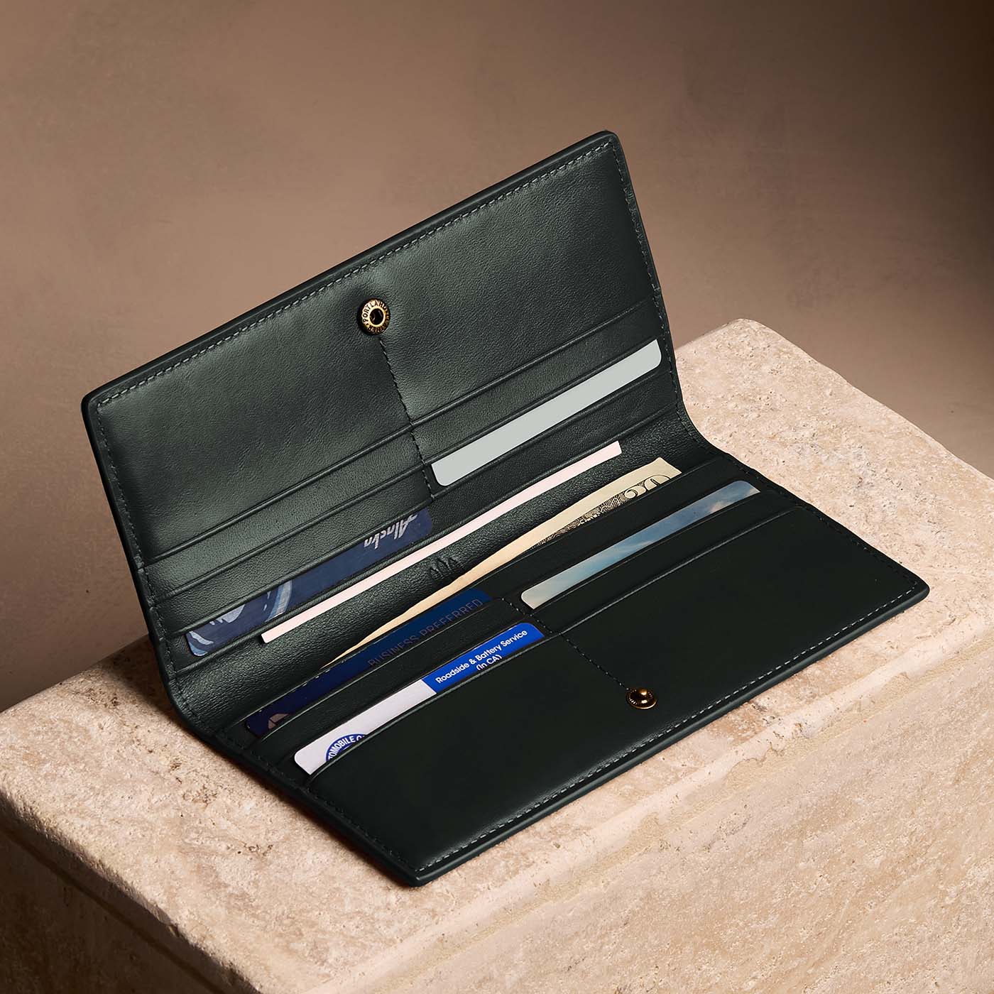 Regent Green*Large | Slim leather bifold wallet with multiple card slots and a zippered back pocket