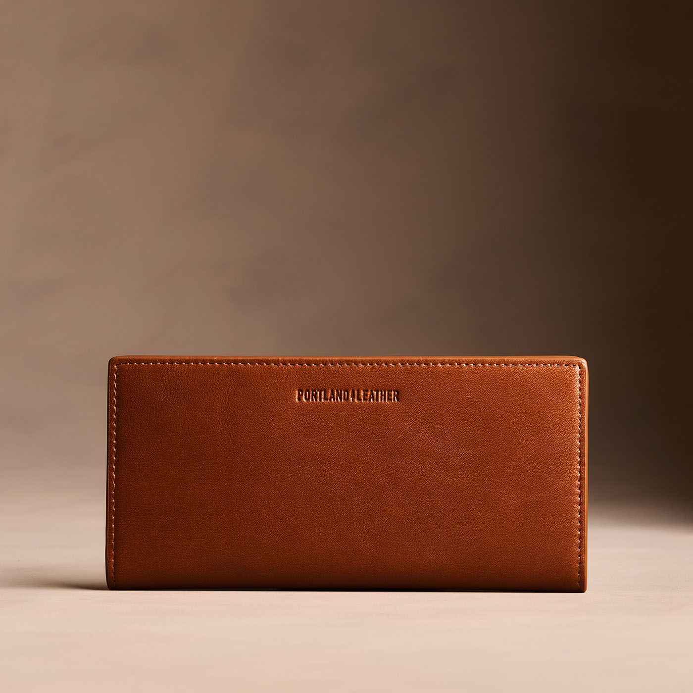 Vintage Tan*Large | Slim leather bifold wallet with multiple card slots and a zippered back pocket