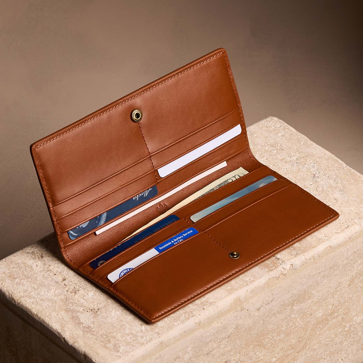 Vintage Tan*Large | Slim leather bifold wallet with multiple card slots and a zippered back pocket