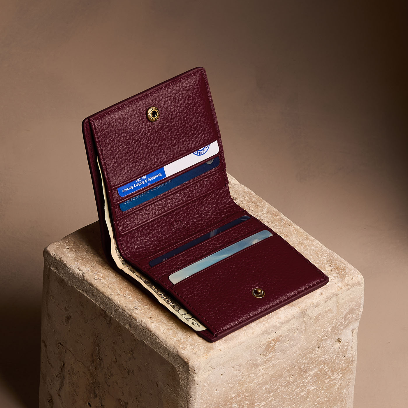 Hunter*Small | Petite slim leather bifold wallet with multiple card slots and a zippered back pocket