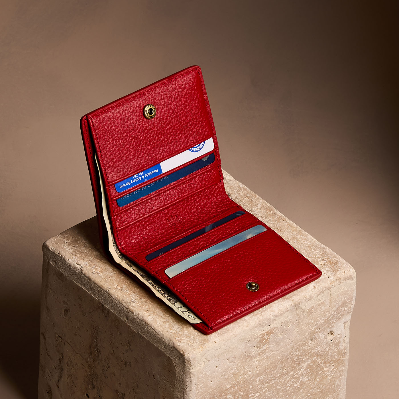 Icon Red*Small | Petite slim leather bifold wallet with multiple card slots and a zippered back pocket