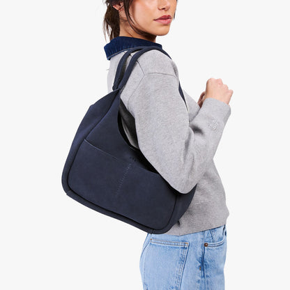 Alaska Blue*Medium | U-shaped, flat-bottomed leather shoulder bag with two outside pockets