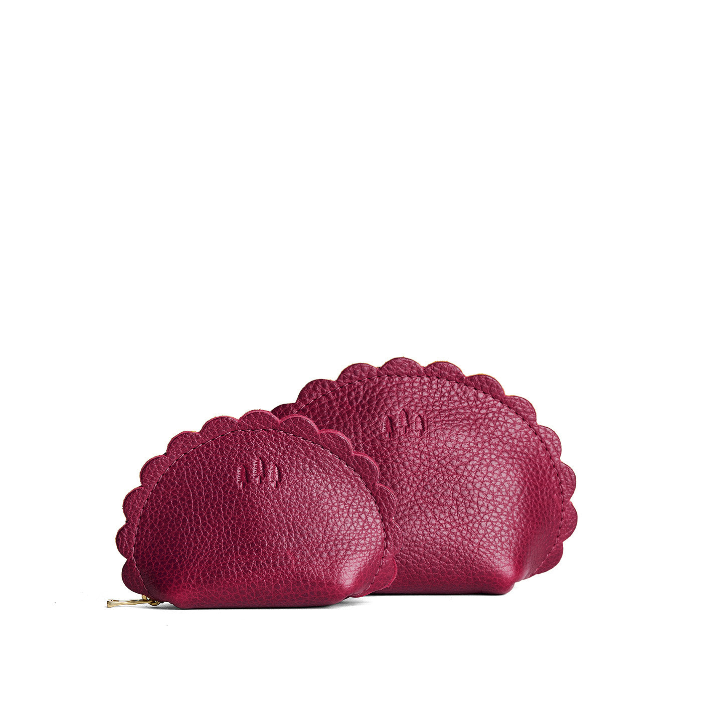 Orchid | Curved leather pouch with zipper and scalloped edges