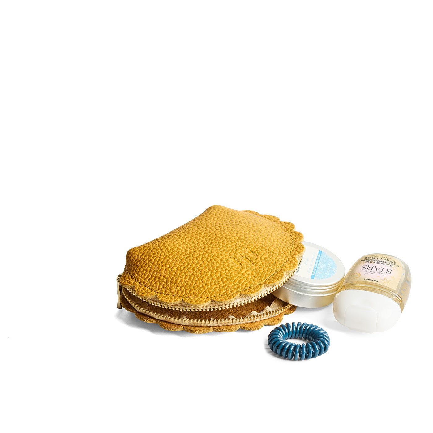 Sunshine*Small | Curved leather pouch with zipper and scalloped edges