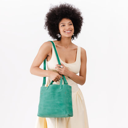 Reef | Midsize crossbody tote with handles and a pocket