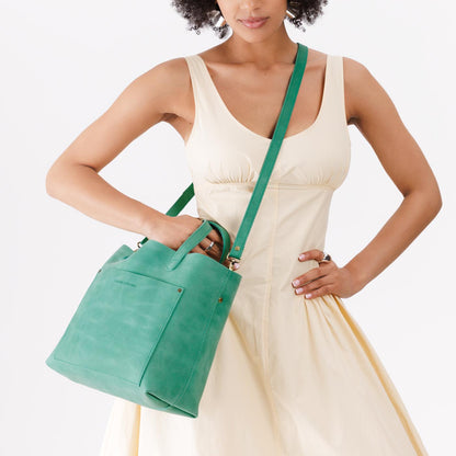 Reef | Midsize crossbody tote with handles and a pocket