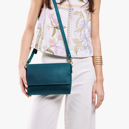 Westward Blue*Medium | Model Wearing Small Leather Crossbody Bag with Magnetic Messenger Bag Closure