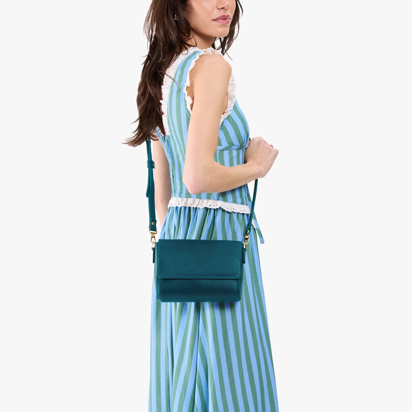 Westward Blue*Mini | Model Wearing Small Leather Crossbody Bag with Magnetic Messenger Bag Closure