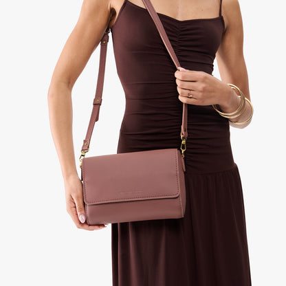 Sunkissed*Medium | Model Holding Leather Crossbody Bag with Magnetic Messenger Bag Closure
