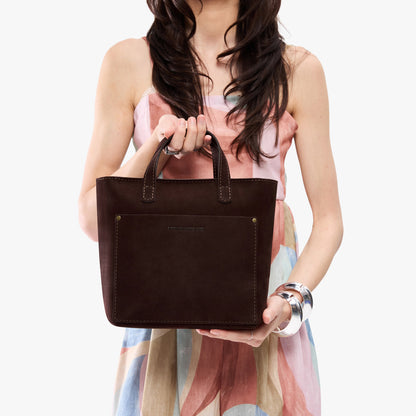 Velvet Brown*Zipper | Model carrying crossbody tote bag with snap closure and front pocket