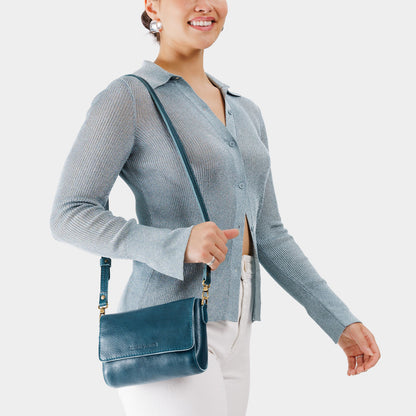 Lagoon*Mini | Model wearing Small Leather Crossbody Bag with Magnetic Messenger Bag Closure