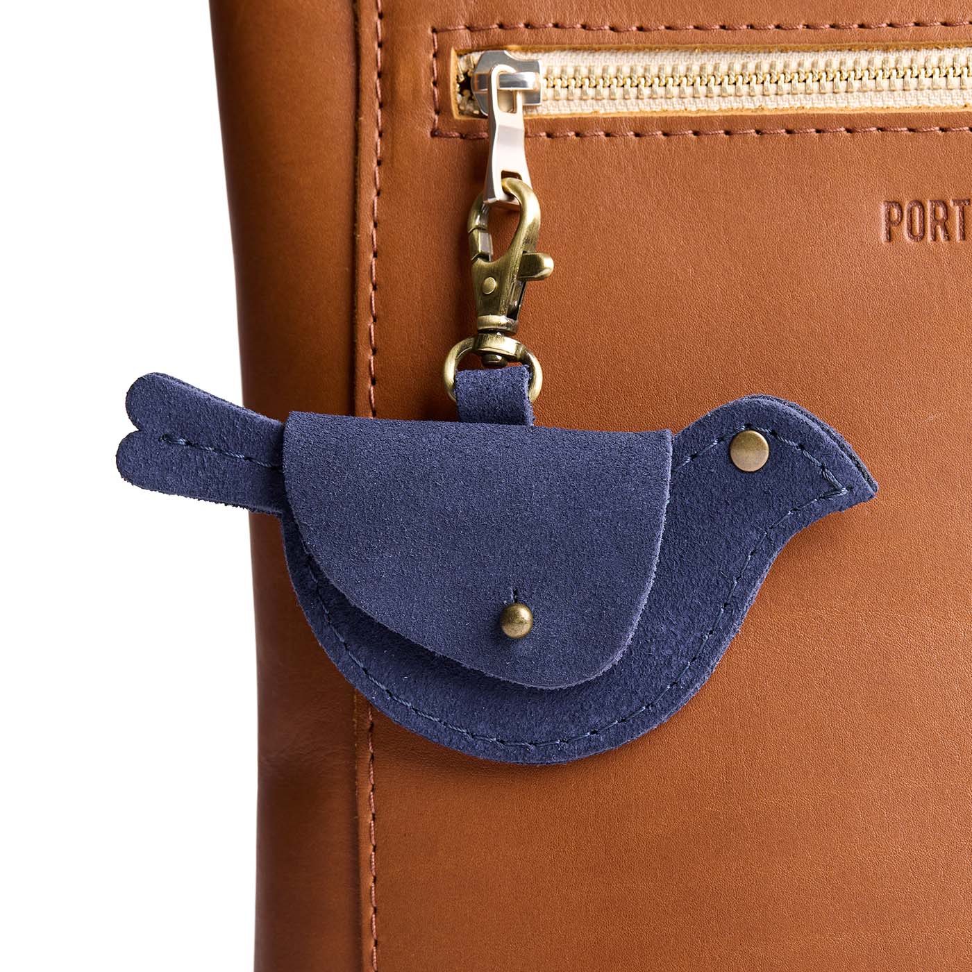 Alaska Blue | Bird shaped pouch with button closure and lobster clasp