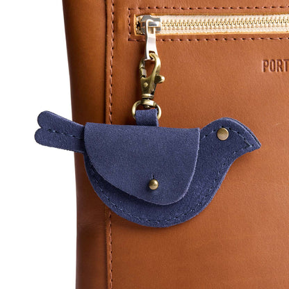 Alaska Blue | Bird shaped pouch with button closure and lobster clasp