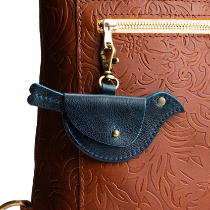 Boreal | Bird shaped pouch with button closure and lobster clasp