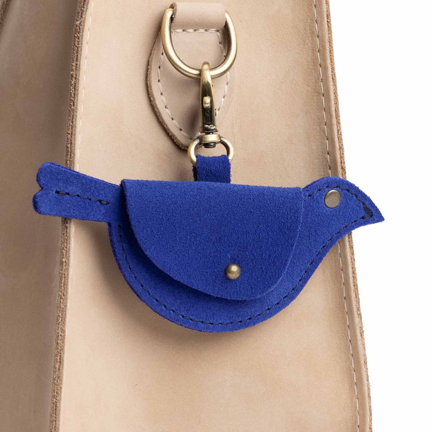 Joni Blue | Bird shaped pouch with button closure and lobster clasp