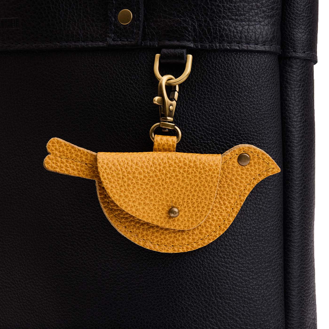 Sunshine | Bird shaped pouch with button closure and lobster clasp
