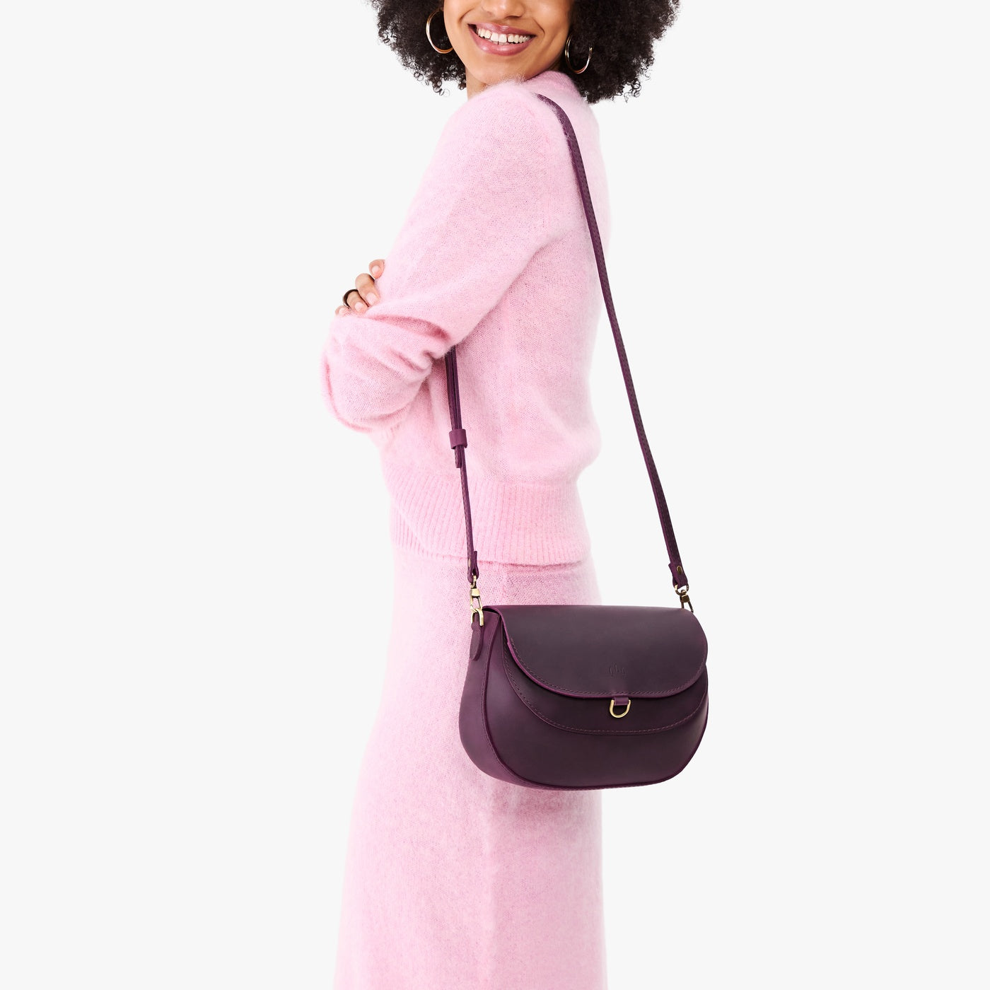 Larkspur*Large | Model wearing a leather Crossbody with a flap and magnetic closure