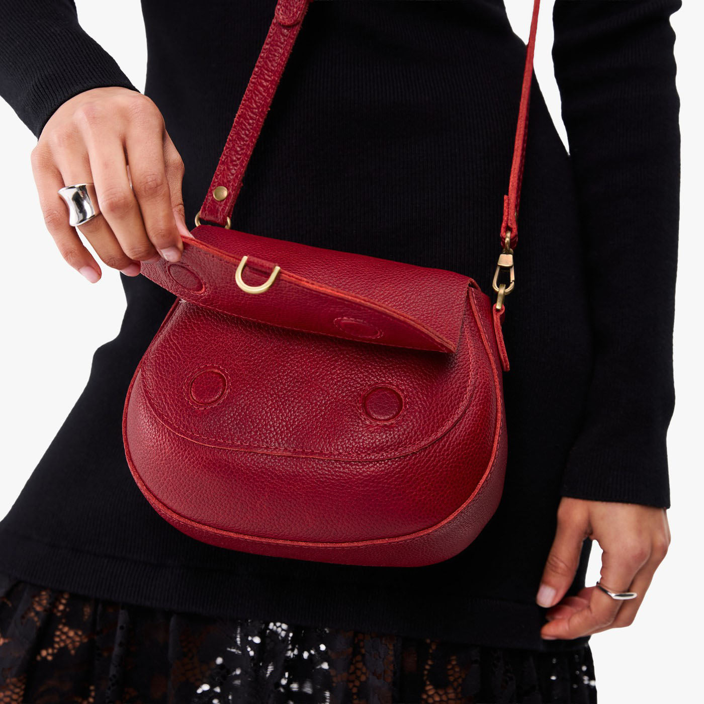 Chili Red*Small | Model wearing a petite leather Crossbody with a flap and magnetic closure