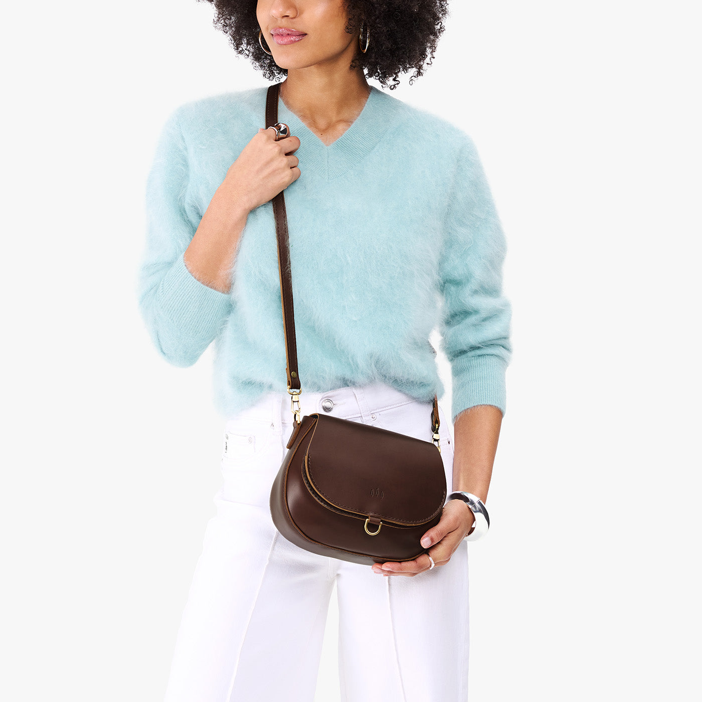 Chocolate Brown*Small | Model wearing a petite leather Crossbody with a flap and magnetic closure